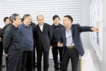 马凯：促进新能源汽车加快发展