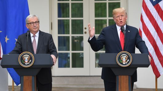 US President Donald Trump and European Commission President Jean-Claude Juncker (L) leave after making a statement in the Rose Garden of the White House in Washington, DC, on July 25, 2018.