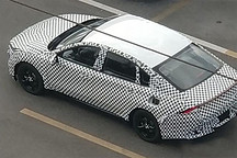 硬剛比亞迪？五菱新車諜照流出，或定位A級插混轎車