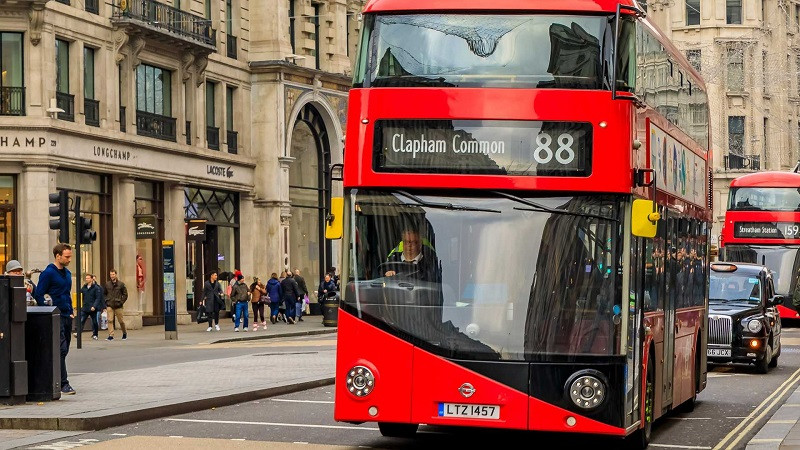 regent-street-with-people-passing-by-and-a-double-decker-red-bus.jpg