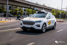 中国首次允许「方向盘后无人」，自动驾驶上演「全球争霸赛」