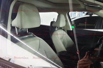 起亚CV内饰谍照曝光 头枕造型够独特