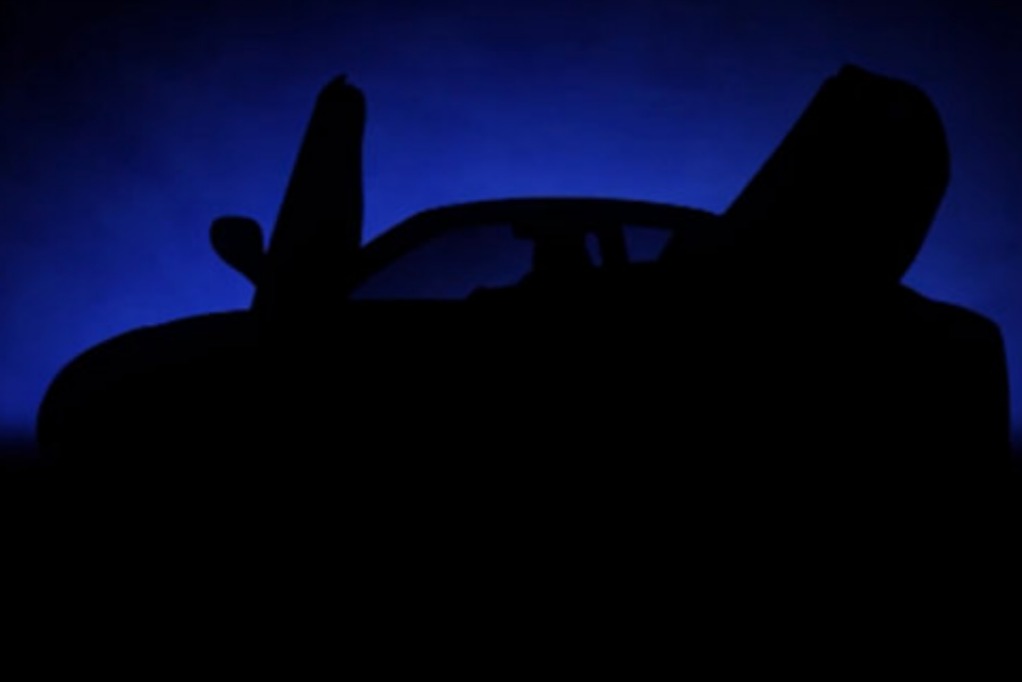 MG发布Cyberster量产版预告图，续航超800公里，剪刀门设计很拉风