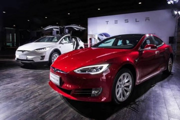 广州车展观察：特斯拉新国标接口车型亮相 马斯克回应国产起码三年