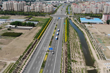 AI+临港:自动驾驶集卡能在东海大桥上与社会车辆混跑