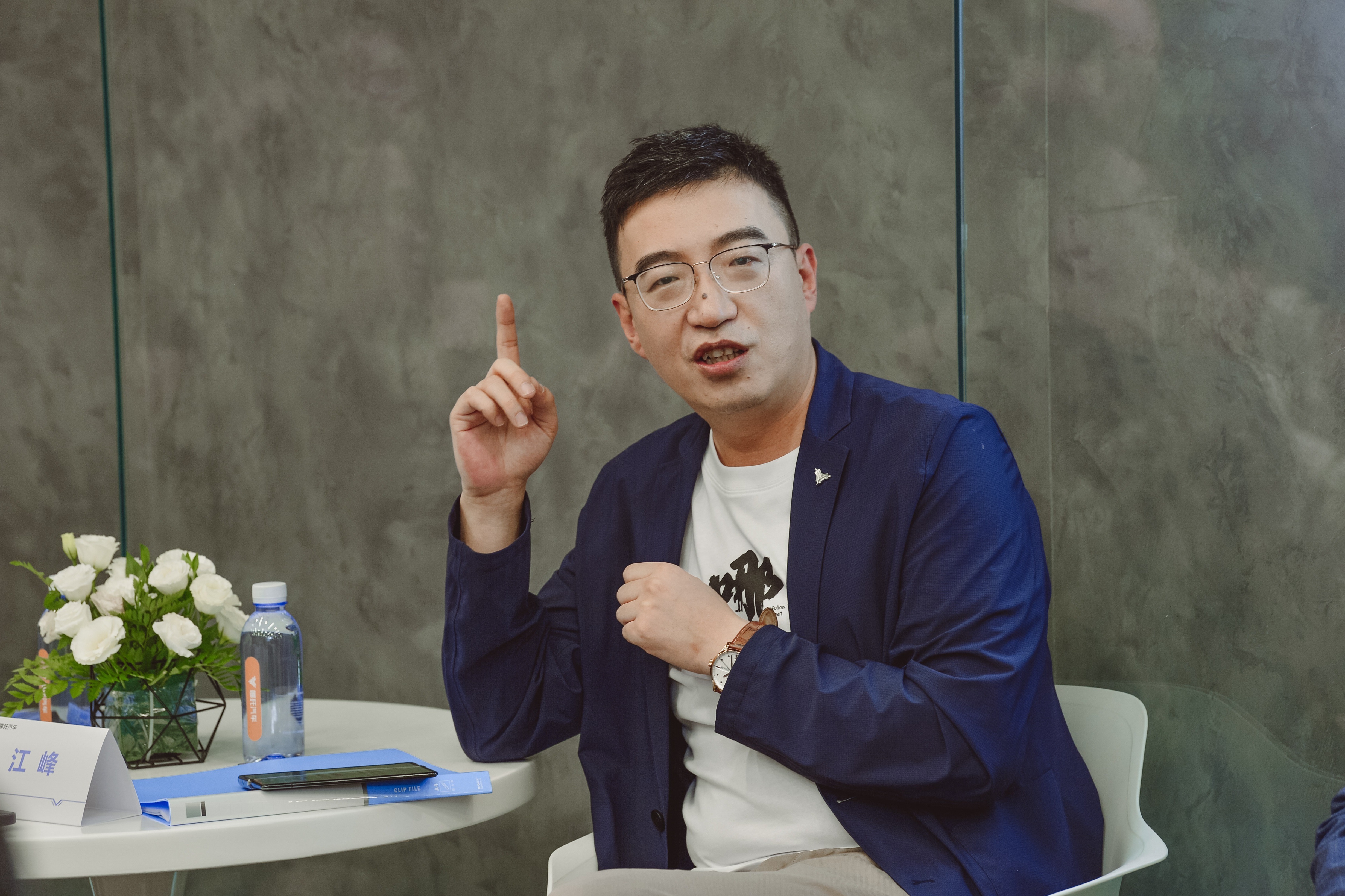 哪吒汽车江峰:不能简单靠价格,我们要用实力说话