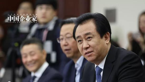 2018年3月4日，全国政协委员、恒大集团董事局主席许家印参加政协小组讨论。摄影：肖予为